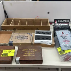 Assorted cigar storage boxes, displays, and accessories. Includes (2) Rocky Patel "The Edge" wooden boxes, (1) Espinosa Habano La Zona wooden box, (1)