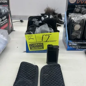 Quantity of Vertigo butane lighters. Features a variety of styles and finishes, including metallic silver and matte black designs. Each lighter is acc