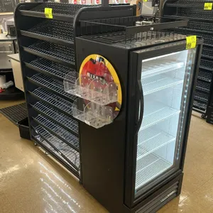 Candy and magazine display racking. Features integrated LED lighting, sloped wire shelving, and side-mounted clear plastic display bins. Black finish.