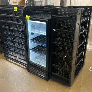 Candy and magazine display racking. Features integrated LED lighting, adjustable wire shelving, and pegboard backing. Black finish. Dimensions: 81"x36