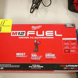 Milwaukee M12 FUEL 2552-22 1/4" stubby impact wrench kit. Features up to 100 ft-lbs of nut-busting torque and 4-mode drive control. Note: Contents of 