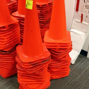 Orange PVC traffic safety cone. Features a molded square base. Stackable design.