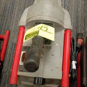 RIDGID K-60SP compact sectional drain cleaning machine. Features a FOR/OFF/REV toggle switch, manual clutch lever handle, and dual-carrying handle fra