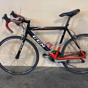 ORANGE/BLACK CCM PRESTO LIGHTWEIGHT ENTRY-LEVEL 21-SPEED ROAD BIKE
