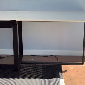 NATUZZI ITALIA MARBLE TOP OMEGA DESK. BLACK SATIN METAL BASE, SIDE DRAWER. 55" X 21" RETAIL $5000