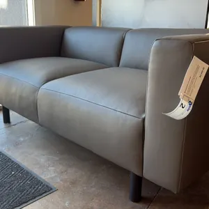 BONNE CLUB LOVESEAT. GREY LEATHER, FORMAL APPEARANCE. MODEL EVOKE GR200 67"W X 34" DEEP.