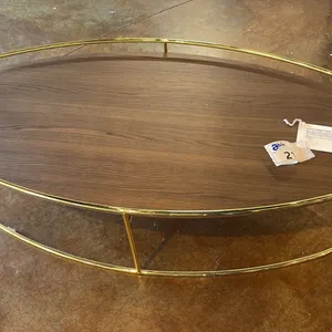 CALLIGARIS  BRASS AND COMPOSITE WOOD OVAL TABLE. 45" X 21" X 12" HIGH RETAIL $1300