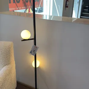 BLUM STEM FLOOR LAMP. BLACK. SIMPLE GEOMETRIC SHAPES. 62" HIGH