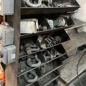 SMALL BLACK PARTS STORAGE SHELF WITH ASSORTED SCREW PIN SHACKLES & HARDWARE
