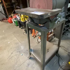 DELTA SI848910WCCW INDUSTRIAL DISC SANDER ON SMALL EQUIPMENT TABLE