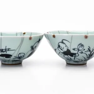 PAIR OF CHINESE BLUE AND WHITE CRACKLE GLAZE FIGUS