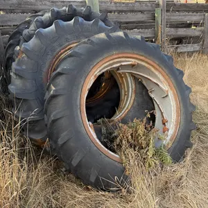 Rear Tractor Tires and Rims * This item Sold Live On-Site only. Must attend auction in person to purchase.