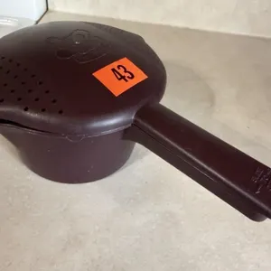 Pampered Chef microwave cooker, magnet collection