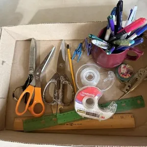 Office supplies, tape, scissors, writing utensils
