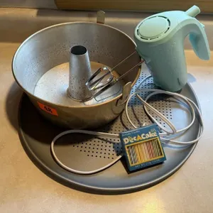 Pizza pan, bundt pan, hand mixer, candles