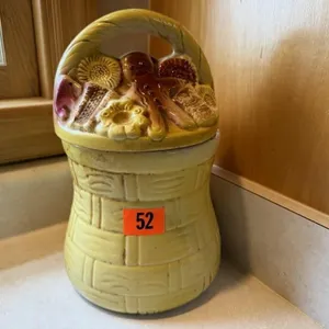 Floral basket cookie jar