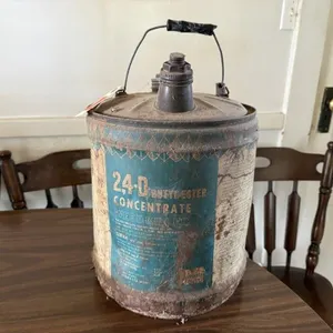 Vintage weed killer metal can