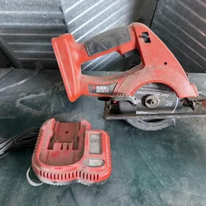 Black & Decker cordless saw, charger, no battery