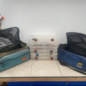 A pair of Plano tackle bags comes with misc tackle