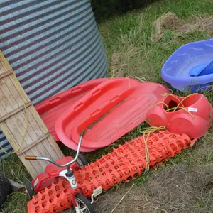 Roll of Snow Fence, 3 Plastic Toboggan, 1 Wooden Toboggan, kids tricycle, kids pool