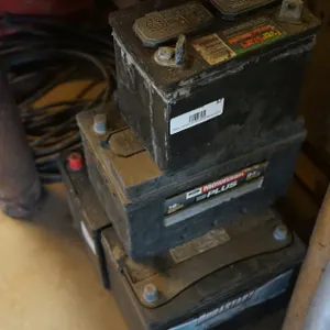 4 Old Automotive Batteries