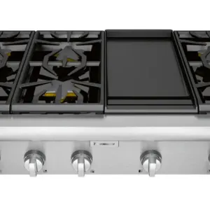 Thermador PCG486WD 48" gas rangetop. Features stainless steel construction, 6 gas burners, and an integrated griddle. S/N: 394080299973001992. Note: I