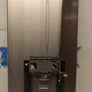 LG ADD74795810 refrigerator door foam assembly. Features stainless steel construction with an integrated water and ice dispenser recess and pre-instal