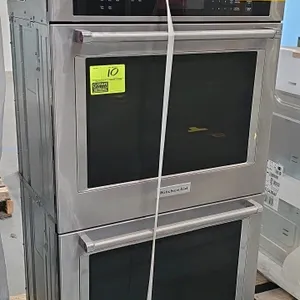 KitchenAid KODE300ESS built-in double electric wall oven. Features stainless steel finish, glass touch controls, and large oven windows. Includes uppe