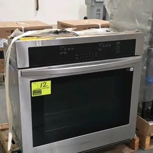 Samsung NV51T5511SS 30-inch single electric built-in wall oven. Features stainless steel exterior, blue porcelain enamel interior, electronic touch co