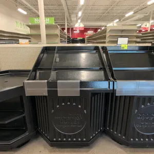 40" Poly dump merchandiser lot. Features molded black plastic construction, slanted display deck, clear product guard, and embossed 'Grocery Outlet Ba