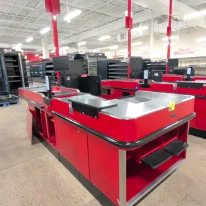 2024 Royston UL-6-55-LH-1 metal checkout lane. Features single conveyor belt, under-counter storage cabinets, bag stand, and a Dell E1715S monitor. Di