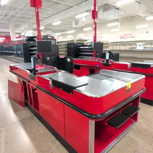2024 Royston UL-6-55-LH-1 metal checkout lane. Features a single belt lane, under-counter storage cabinets, bag stand, and a Dell E1715S monitor. Dime