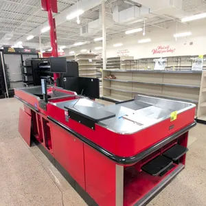 2024 Royston UL-6-55-LH-1 metal checkout lane. Features a single belt lane, under-counter storage, bagging stand, and Dell 18" monitor. Dimensions: 13