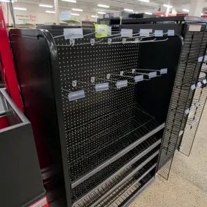 Portable double-sided metal merchandise rack. Features black metal construction with pegboard backing on both sides. Equipped with peg hooks, clear pr