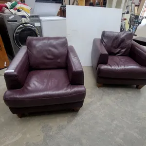 Pair of Plum Leather Style Armchairs with Wide Arms and Loose Back Cushions