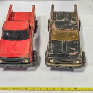 2 vintage pressed  metal Tonka model trucks, 14"