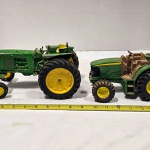 2 John Deere die cast tractors; 9"
