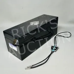 13.5" long black laquer box w/ bolo tie