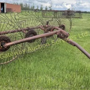 Four wheel finger wheel hay rake