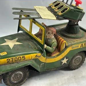 Vintage Tin Army Jeep Missile launcher toy