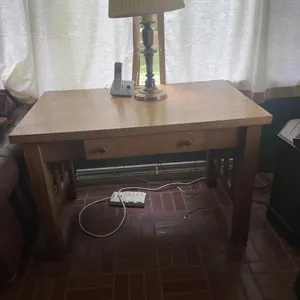 Wooden mission desk with lamp and telephone