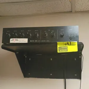 TOA 500 Series A-503A mixer amplifier. Features 5-channel inputs with individual volume controls, bass and treble tone controls, and a master volume c