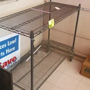 Metro 2-tier wire utility cart. Features two wire shelves. Dimensions: 21"x48"x39". Mounted on four swivel casters.
