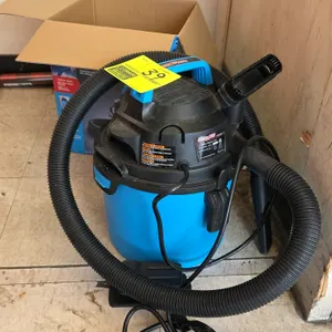 Channellock VOM205P.CL 2.5-gallon wet/dry vacuum cleaner. Features a 2 peak HP motor, integrated carry handle, and blower port. Includes flexible hose
