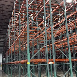 Interack pallet racking section. Features green uprights and orange step beams with teardrop connections. Includes 3.5" cross bars with approximately 
