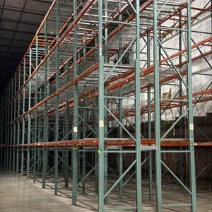 Interack pallet racking system. Features green uprights and orange 3.5" cross bars. Includes (124) 8', (2) 6', and (8) 12' sections measuring 3'8"D x 