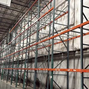 Interack pallet racking system. Features (70) 8' and (2) 12' sections, measuring 3'8"D x 26'H. Equipped with 3.5" cross bars with approximately 4-deck