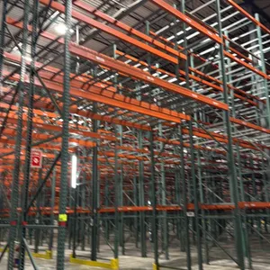 Interack pallet racking system featuring (130) 8' and (10) 12' sections with uprights measuring 3'8"D x 26'H. Includes orange 3.5" cross beams with ap