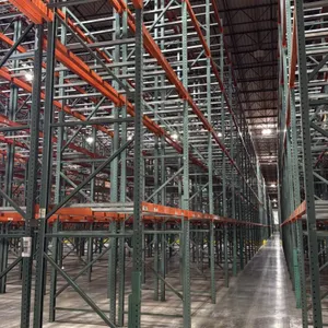 Interack pallet racking system. Includes (130) 8' and (10) 12' sections with 3.5" cross bars. Dimensions: 3'8"D x 26'H. Features green uprights and or