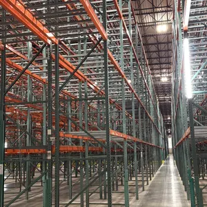 Interack pallet racking system. Features (130) 8' and (10) 12' sections with 3'8"D x 26'H uprights and 3.5" cross bars. Configured with approximately 